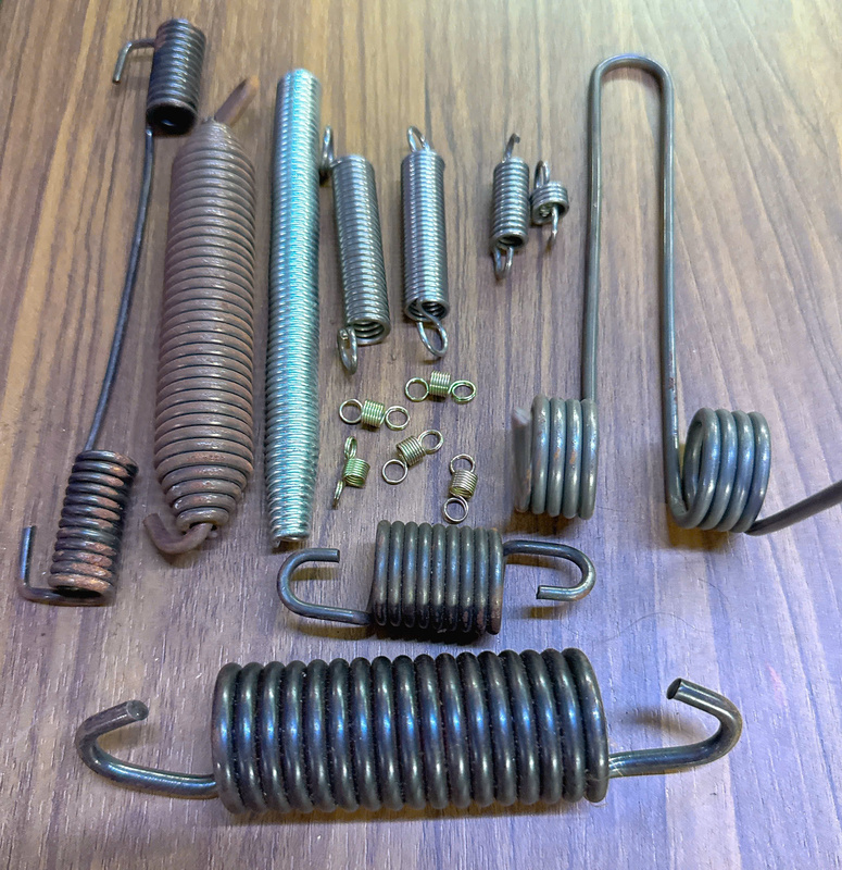 Lò xo kéo bẻ móc