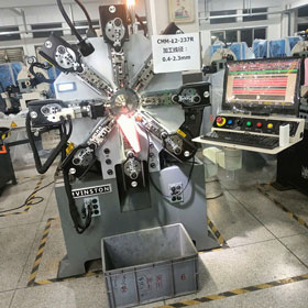 Máy sản xuất lò xò